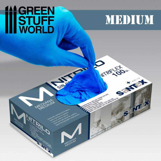 Hand wearing nitrile gloves, picking up another pair of nitrile gloves from a box, size M