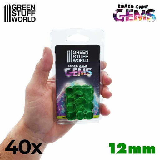 Hand holding 40x green plastic gems 12mm packackage