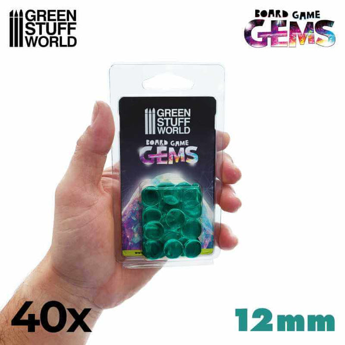 Hand holding 40x turquoise plastic gems 12mm package