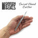 Hand holding professional metal swivelhead hobby knife. 5.4mm wide.