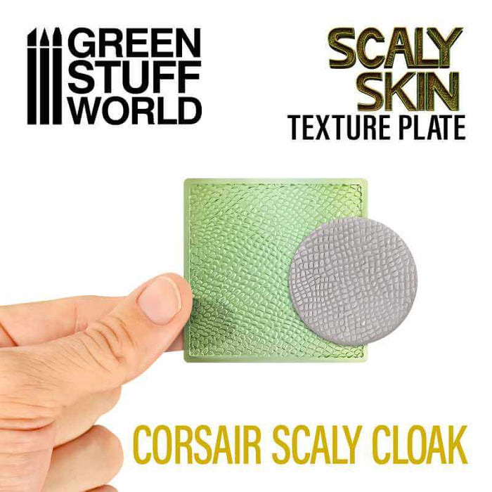 Hand holding the corsairs scaly cloak texture plate